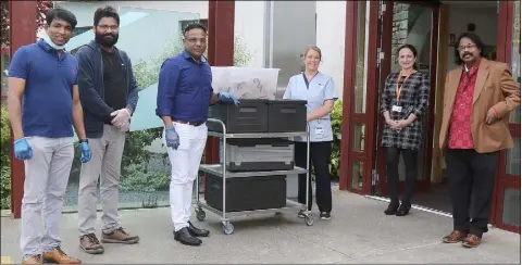  ??  ?? (From left) Bino, Manoj and Biju from The Holy Grail) with Nollaig McGrath (Clinical Nurse Manager) and Jenny Dowling (Assistant Director of Nursing) at St John’s Hospital and Dr George Leslie from Slaney Medical Centre.