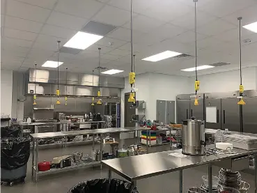  ?? (Staff photo by Mallory Wyatt) ?? Culinary arts instructor Beth Boyd said students were cramped in the previous learning kitchen and had to take turns to cook. Now all can cook at the same time in the new kitchen. Pictured is the new kitchen on Wednesday.