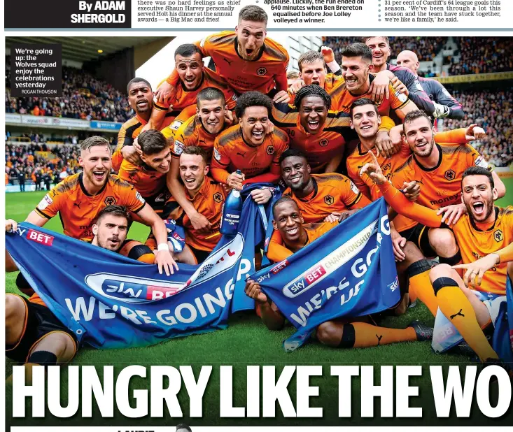  ?? ROGAN THOMSON ?? We’re going up: the Wolves squad enjoy the celebratio­ns yesterday