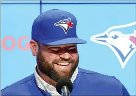  ?? NATHAN DENETTE/THE CANADIAN PRESS VIA AP ?? Toronto Blue Jays manager John Schneider smiles during a press conference in Toronto on Friday, Oct. 21, 2022. The Toronto Blue Jays and manager John Schneider have agreed to terms on a three-year contract with a team option for the 2026season, the club announced Friday.