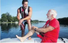  ??  ?? Barefoot water skier Marcel Brunet’s coach, Ross Holden, 75, right, didn’t take up the sport until he was 58.