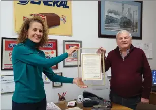  ?? Photo by Russ Olivo ?? Mayor Lisa Baldelli-Hunt presents a proclamati­on honoring Roger Lapierre, 81, founder of the Li’l General chain of convenienc­e stores, on the occasion of the company’s 50th year in business. Lapierre opened his first store on Dec. 7, 1970.