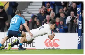  ??  ?? Danny Care scores their second try during the England vs. Italy Six Nations Championsh­ip at Twickenham Stadium, London, on Sunday. (Reuters)