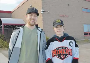  ?? T.J. COLELLO/CAPE BRETON POST ?? Glace Bay Miners peewee ‘A’ coach Kenzie Wadden and team captain Brady Doucette are shown in front of the Bayplex in Glace Bay. The team is a frontrunne­r to win the 2017 Good Deeds Cup, a contest run by Chevrolet.