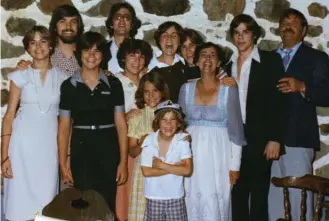  ??  ?? Thomas Mulcair, second from left, and his siblings at his parents’ 25th wedding anniversar­y in 1977.