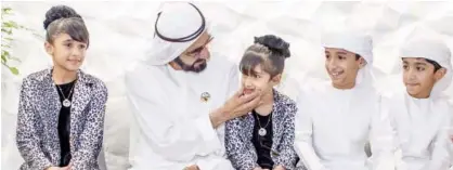  ??  ?? Sheikh Mohammed during his visit on Sunday to the Emirati family that opted for homeschool­ing for its four children.