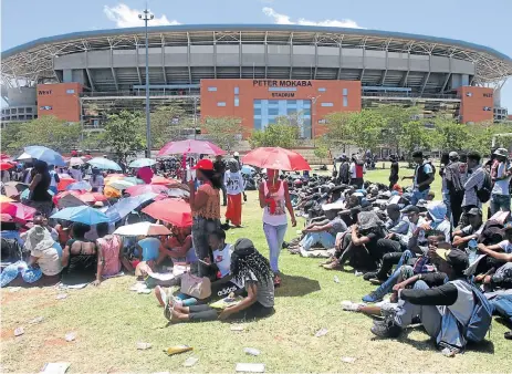  ?? /Antonio Muchave ?? Seeking qualificat­ions: Prospectiv­e students wishing to register for courses at Capricorn TVET College in Polokwane in January formed long queues in the Peter Mokaba Stadium to get registered.