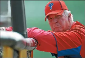  ?? ERIC HARTLINE — MEDIANEWS GROUP FILE ?? Phillies manager Charlie Manuel behind the batting cage during spring training workouts on Feb 22, 2011 at Bright House Field in Clearwater, Florida.