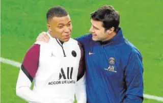  ?? EFE ?? Mbappé y Pochettino, ayer en el Camp Nou