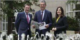  ?? Photo Colm Mahady / Fennells ?? Kerry Group CEO Edmond Scanlon (centre) with Brian Mehigan, Kerry Group Chief Financial Officer, and Marguerite Larkin, Kerry Group designate Chief Financial Officer at the launch of Kerry Group’s 2018 half year interim management report in Dublin.