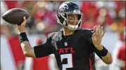  ??  ?? Matt Ryan completed 34 of 46 passes for 300 yards and two touchdowns. He had three intercepti­ons and finished with a passer rating of 80.