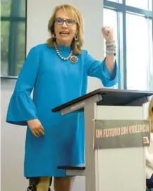  ?? MIKE STOCKER/SOUTH FLORIDA SUN SENTINEL PHOTOS ?? Former congresswo­man Gabrielle Giffords speaks at the Parkland Library on Saturday against permitless carry legislatio­n, later comforting Anthony Montalto, right, father of Gina Montalto, after he gave an impassione­d speech.