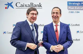  ?? ?? El presidente de CaixaBank, José Ignacio Goirigolza­rri, y el CEO de CaixaBank, Gonzalo Gortázar.