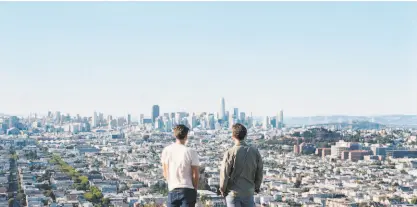  ?? Andrew Paynter ?? Ben Gibbard and Tycho, here atop San Francisco’s Bernal Hill, collaborat­ed on “Only Love.”