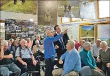  ??  ?? Shepherd Roddy McDiarmid explains the finer points of his art to George Findlater of Historic Environmen­t Scotland during an Ardkinglas shepherdin­g exhibition at Here We Are in 2017.