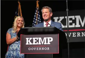  ?? NICOLE CRAINE / THE NEW YORK TIMES ?? Gov. Brian Kemp declares victory in the Georgia Republican primary on Tuesday night in Atlanta. In a landslide victory that represente­d a resounding rebuke of Donald Trump, Kemp won the Republican nomination for a second term, turning back a Trump-fueled primary challenge and delivering the former president his biggest electoral setback of the 2022 primaries.