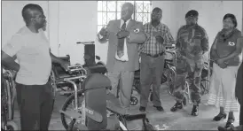  ??  ?? Jairos Jiri board member Mr Edwards Mundanga (second from left), stresses a point on the need to ensure that proper equipment is availed to those who are living with disabiliti­es to Nguboyenja Training Centre training officer Mr Timothy Mutonhori...