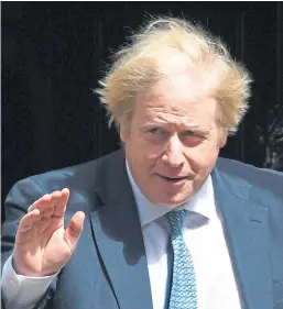  ?? Pictures: PA. ?? Health Secretary Jeane Freeman, top, during the Scottish Government’s daily briefing in Edinburgh, and Prime Minister Boris Johnson, who is urging the British people to remain patient amid the lockdown.