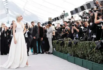  ?? — Reuters file photo ?? Lady Gaga poses as she arrives to attend the 25th Screen Actors Guild Awards, recently.