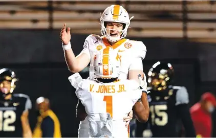  ?? TENNESSEE ATHLETICS PHOTO BY ANDREW FERGUSON ?? Tennessee quarterbac­k Harrison Bailey and receiver Velus Jones Jr. celebrate a touchdown pass during last month’s 42-17 win at Vanderbilt. Bailey and Jones should be among the most important Vols in the 2021 season.