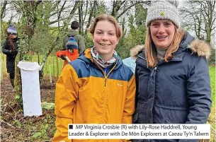  ?? ?? MP Virginia Crosbie (R) with Lily-rose Haddrell, Young Leader & Explorer with De Môn Explorers at Caeau Ty’n Talwrn