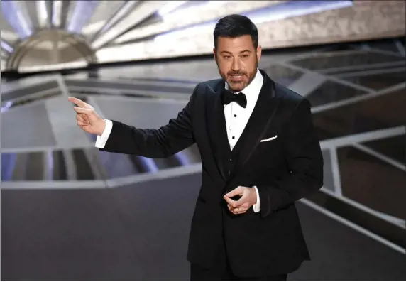  ?? PHOTO BY CHRIS PIZZELLO — INVISION/AP, FILE ?? Host Jimmy Kimmel speaks at the Oscars in Los Angeles on March 4, 2018. Kimmel will again preside over the ceremony in March, the show’s producers said Monday.