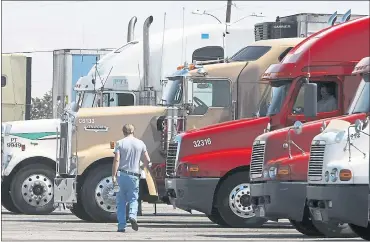  ?? ROBYN BECK — AGENCE FRANCE-PRESSE VIA GETTY IMAGES ARCHIVES ?? In 16 months, new standards meant to reduce sulfur emissions will go into effect and could disrupt fuel supplies crucial to trucking, airlines, railroads and ships. The rules could boost diesel prices by 20 percent to 30 percent.