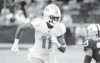  ?? RICK SCUTERI/AP ?? Dolphins receiver DeVante Parker during a game against the Raiders on Sept. 26 in Las Vegas.