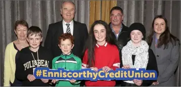  ??  ?? Oulart NS who finished fourth in the Under 13 section. Front: Oisin Moore, Caleb O’Kane, Jennie Grimes and Lillymay Tohill. Back: Frances Cross (ECU), Nicky Cosgrave (chairman ECU), Kevin Lawlor (ECU) and Carmel Codd (teacher).