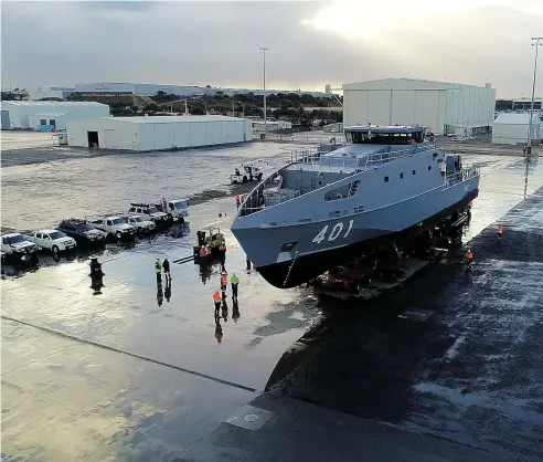  ?? Picture: AAP ?? READY FOR ACTION: The launch of the first of Austal's 21 new Guardian Class Pacific Patrol Boats at Austal's Pacific Patrol Boat shipyard facility in Western Australia.