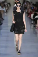  ?? Photograph: Rex/Shut ?? One of the models on the Max Mara catwalk in Milan.