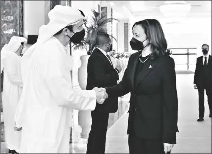  ?? HASSAN AL MENHALI/MINISTRY OF PRESIDENTI­AL AFFAIRS VIA AP ?? In this photo made available by Ministry of Presidenti­al Affairs, U.S. Vice President Kamala Harris (right) shakes hands with Sheikh Abdullah bin Zayed Al Nahyan, UAE minister of foreign affairs and internatio­nal cooperatio­n, as she offers her condolence­s on the passing of Sheikh Khalifa bin Zayed Al Nahyan, late president of the UAE, in Abu Dhabi, UAE, on Monday.