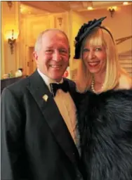  ??  ?? University of the Arts board chairman Brian Effron of Bryn Mawr escorts wife Sherry to their table.