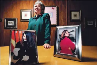  ?? PETER POWER/TORONTO STAR ?? Carolyn Mayeur, acting executive director of Danielle’s Place in Burlington, is shown with pictures of her daughter Danielle, who died four years ago at age 25 after suffering from anorexia for eight years.