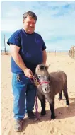  ?? DEBORAH FOX/VALENCIA COUNTY NEWS-BULLETIN ?? Co-owner of the Double J Farm, Jeff Lisowski, and partner, Joe Fraire, not pictured, are donating this little mare to a 5-yearold Texas girl whose miniature horse, Chicken Nugget, was killed last week.