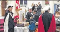  ?? TIM ARSENAULT/THE CHRONICLE HERALD ?? Members of the Knights of Columbus act as an honour guard as the arm of St. Francis Xavier, a sacred Catholic relic, went on display Sunday at St. Mary’s Basilica in Halifax, with morning and afternoon masses, nine hours of public veneration and a talk...