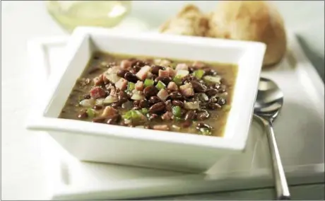  ?? PHOTO COURTESY OF THE SOYFOODS COUNCIL ?? Black soybeans star in this easy Cuban-inspired soup.