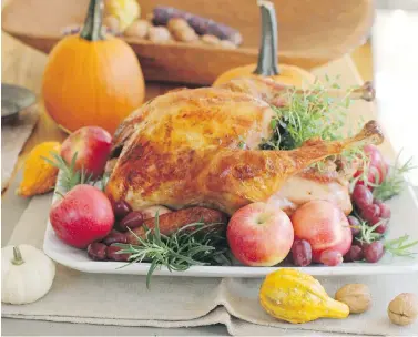  ??  ?? Hosting your first Thanksgivi­ng dinner away from home is a rite of passage, as Stephanie Veniez found out with a punctured roasting pan and some duct tape.