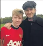  ??  ?? Kieran Freeman with David Beckham at Carrington earlier this year.