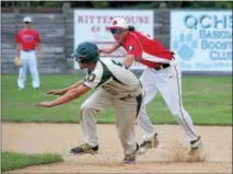  ?? GENE WALSH — DIGITAL FIRST MEDIA ?? Pennridge’s Kolby Rush gets tagged out by Souderton’s Derek Freed on an attempted steal of second base Monday.