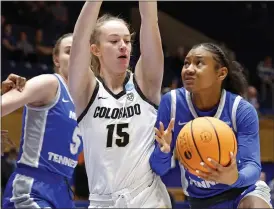  ?? KARL B. DEBLAKER — THE ASSOCIATED PRESS ?? Colorado guard Kindyll Wetta, center, guards Middle Tennessee’s Courtney Blakely during their NCAA Tournament first-round game March 18, 2023, in Durham, N.C.