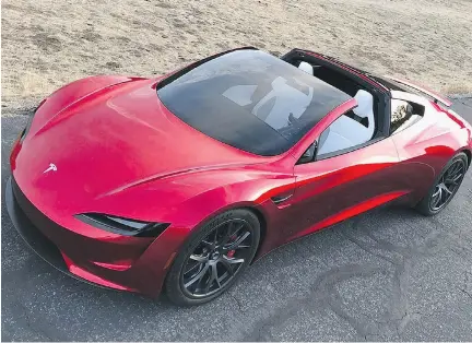  ?? ELON MUSK/TWITTER ?? Tesla is dominating the race with its US$200,000, all-wheel drive Roadster that goes 0-100 km/h in a mind-blowing 1.9 seconds, making it the fastest production car ever, says Barry Ritholtz. Supercar rivals like US$1.3-million McLaren P1 and the...