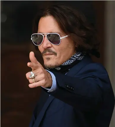  ??  ?? Actor Johnny Depp arrives at the Royal Courts of Justice in London as he sues News Group Newspapers