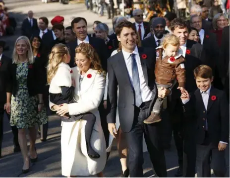  ?? BLAIR GABLE/REUTERS ?? Justin Trudeau heads to his swearing-in this week with his wife, Sophie Grégoire-Trudeau, and their children, Ella-Grace, Hadrien and Xavier.