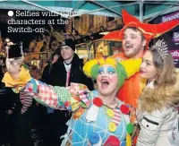  ??  ?? Selfies with panto characters at the Switch-on