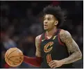  ?? TONY DEJAK — THE ASSOCIATED PRESS ?? The Cavaliers’ Kevin Porter Jr. drives against the 76ers during a Feb. 26, 2020, game at Rocket Mortgage FieldHouse.