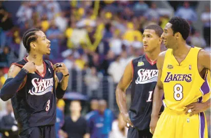  ?? KIM D. JOHNSON/AP ?? In this file photo, Allen Iverson, decked out in the 76ers’ black jersey, argues with the Lakers’ Kobe Bryant at the end of Game 2 of the 2001 NBA Finals in Los Angeles.