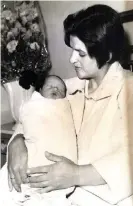  ??  ?? Malama Valkanidis holding her newborn second son Chris in 1969.