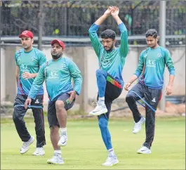  ??  ?? Afghanista­n players during team’s practice session at the M Chinnaswam­y Stadium in Bangalore.