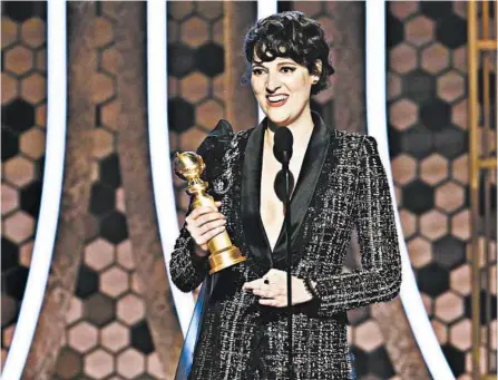  ?? PAUL DRINKWATER/NBC ?? Phoebe Waller-Bridge accepts the award for best actress in a TV comedy series for “Fleabag” Sunday at the Golden Globes.
